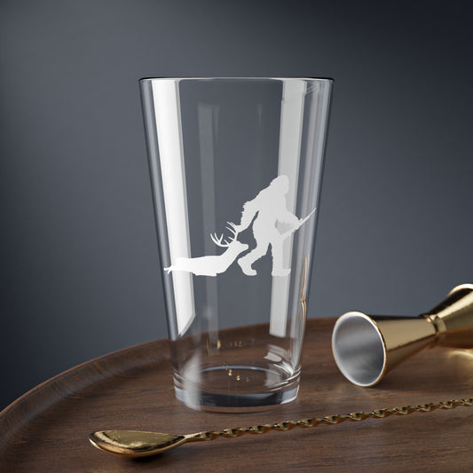 Bigfoot Dragging Deer Pint Glass