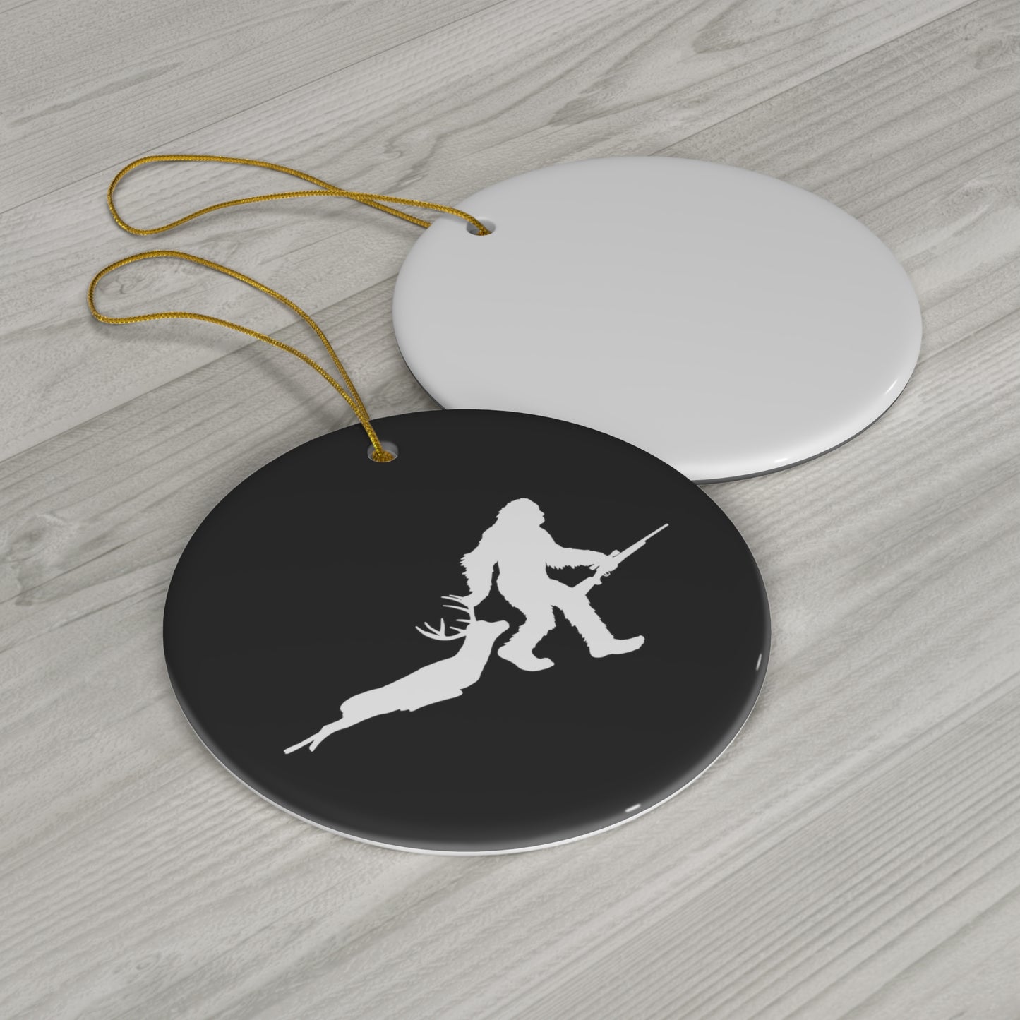 Bigfoot Dragging A Deer Ceramic Christmas Ornament