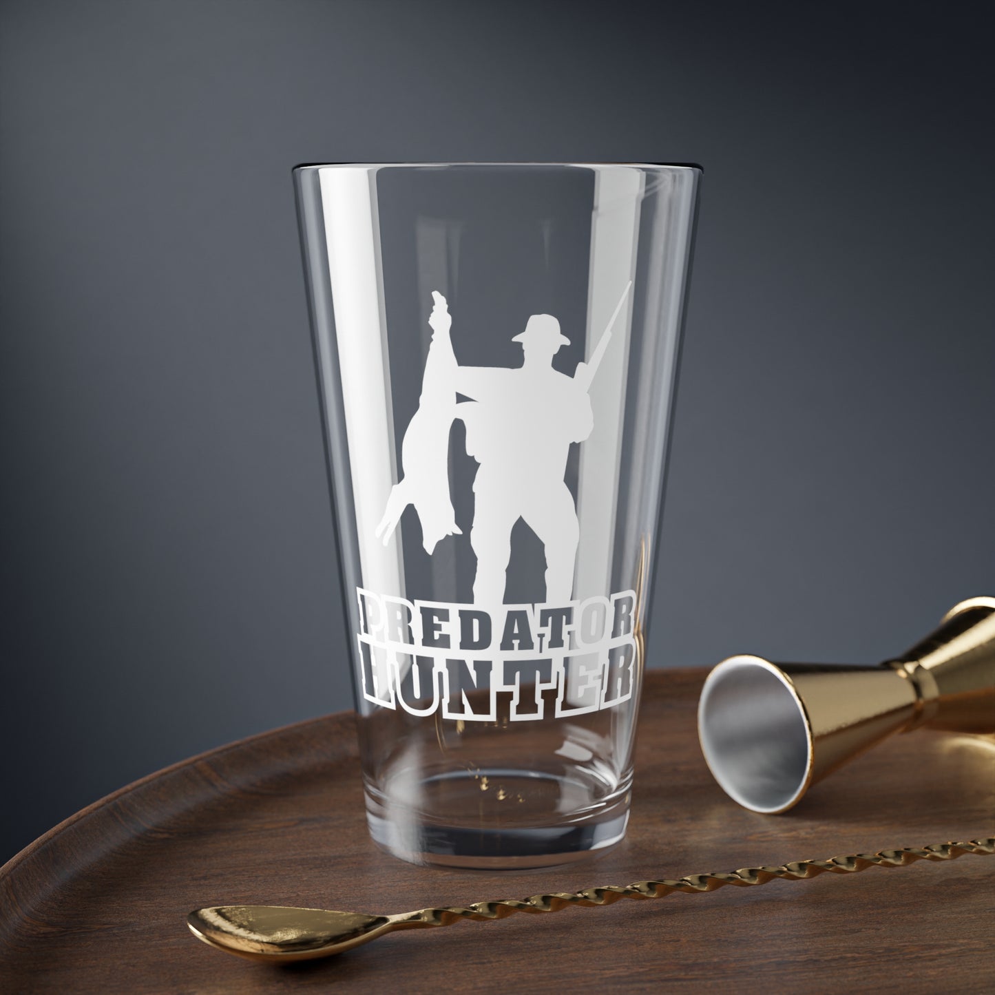 Predator Hunter Holding Coyote Pint Glass