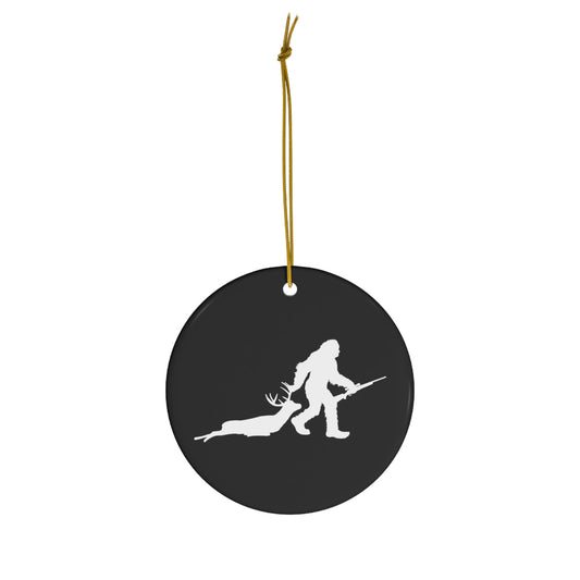 Bigfoot Dragging A Deer Ceramic Christmas Ornament